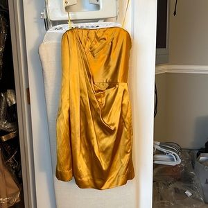 New! BCBG Gold strapless and sexy dress - with tags! Size 0